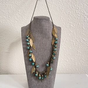 Bohemian-style Egyptian Revival Statement Necklace Brass Tone and Wood Beads